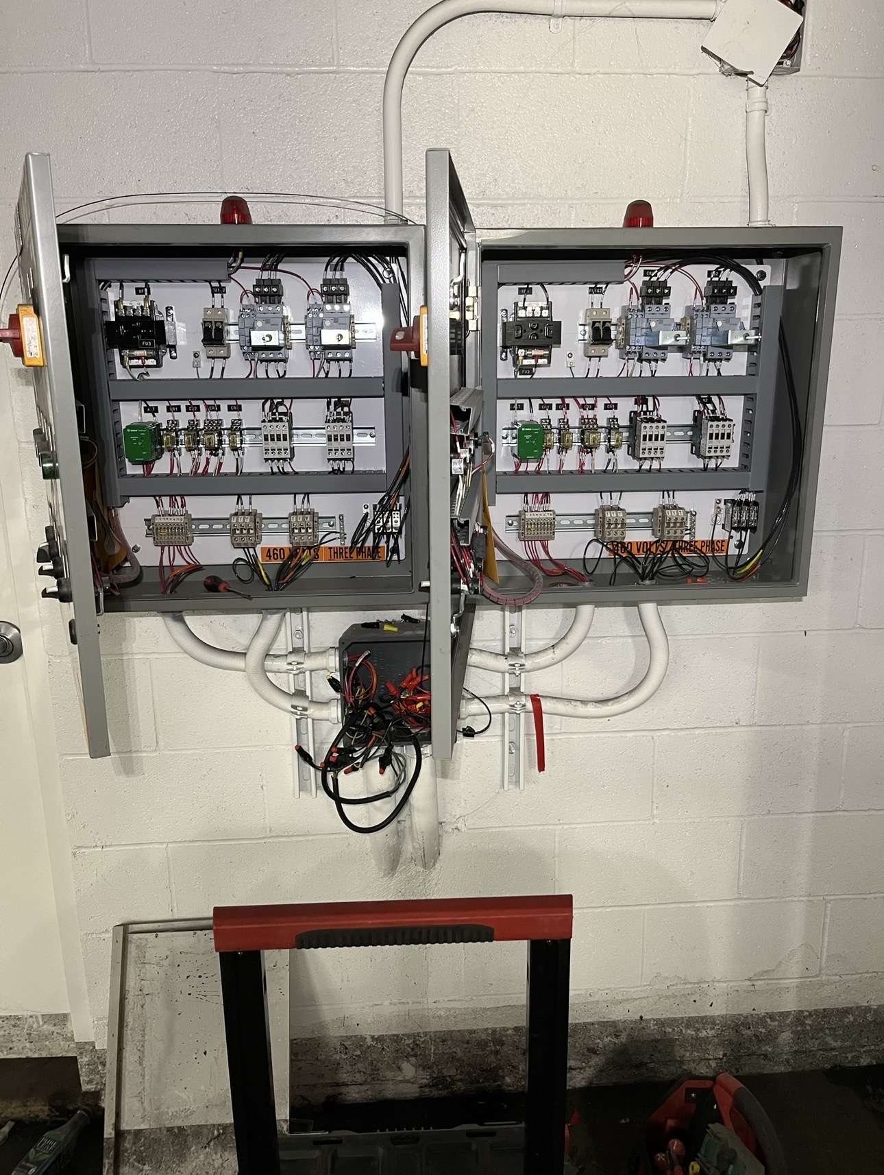 Dual pump control panels for a drainage pump system